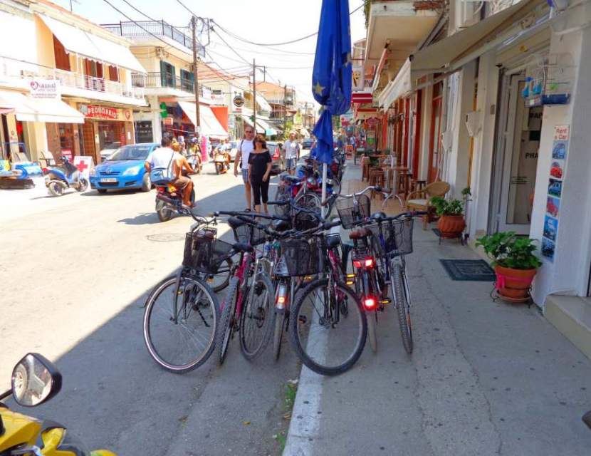 Main road at Nidri. Rent a car at Nidri Car rental, hire a scooter or automatic motorbike at Lefkada.